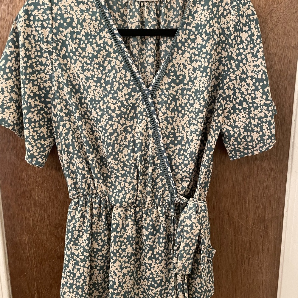 Peplum style tie front top.